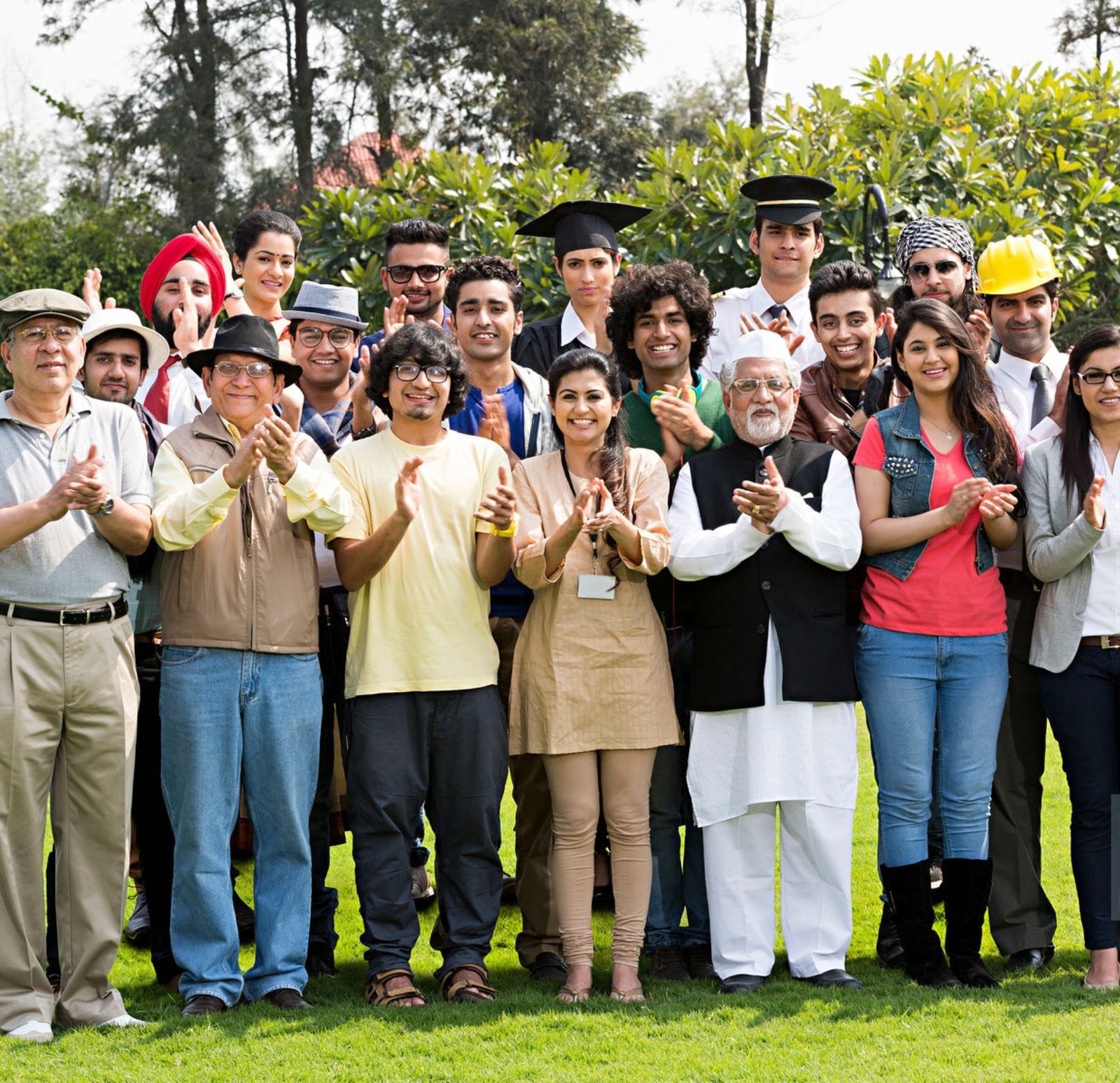 Group of colleagues using laptop during business meeting in a cafe.